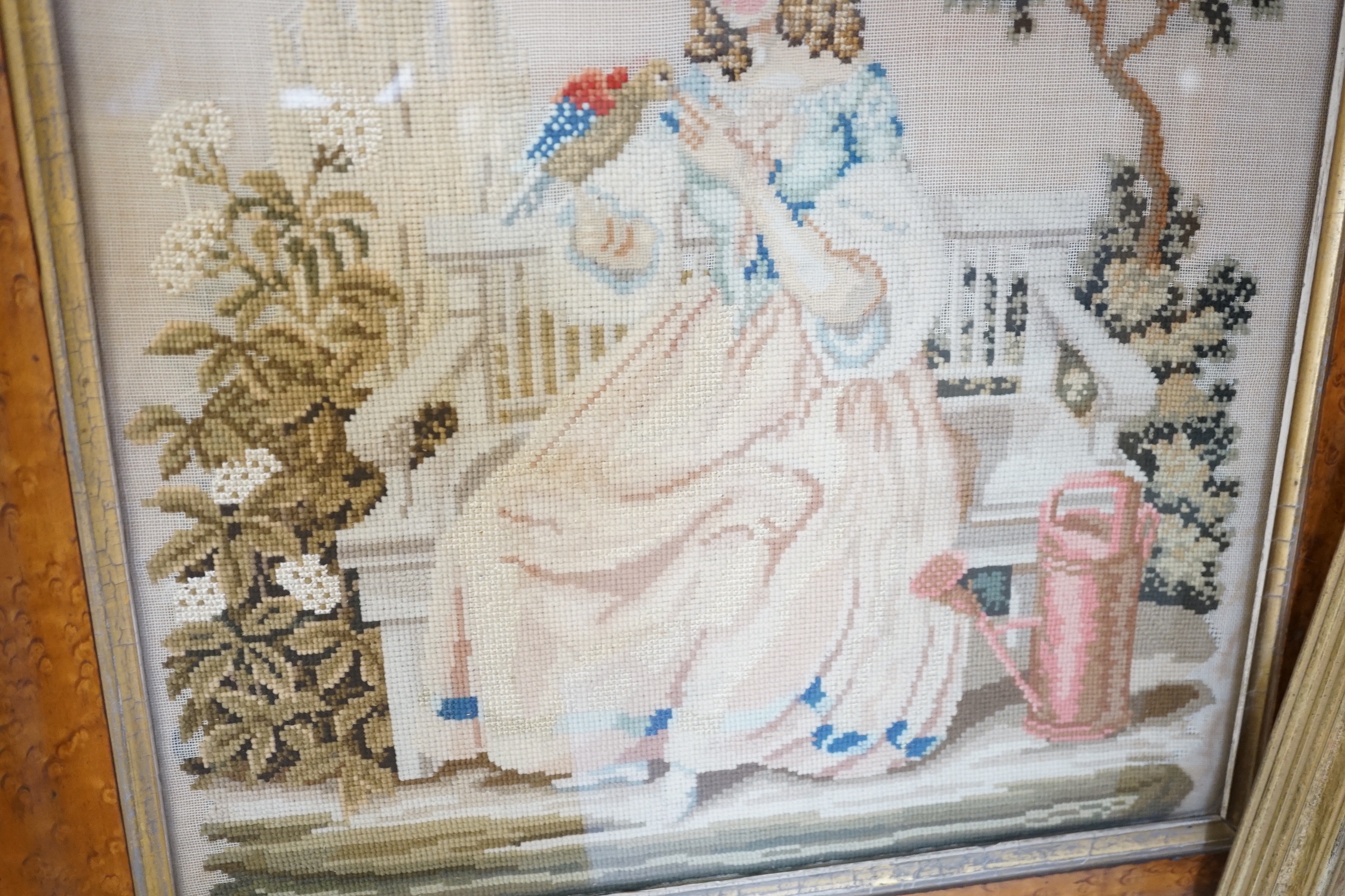 A framed Regency embroidery, two later figurative embroideries and a pair of embroidered slipper fronts, Regency embroidery 37cm wide, 41cm high